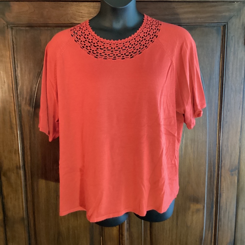 Requirements Woman, 
kinda pumpkin color With gorgeous neckline detail